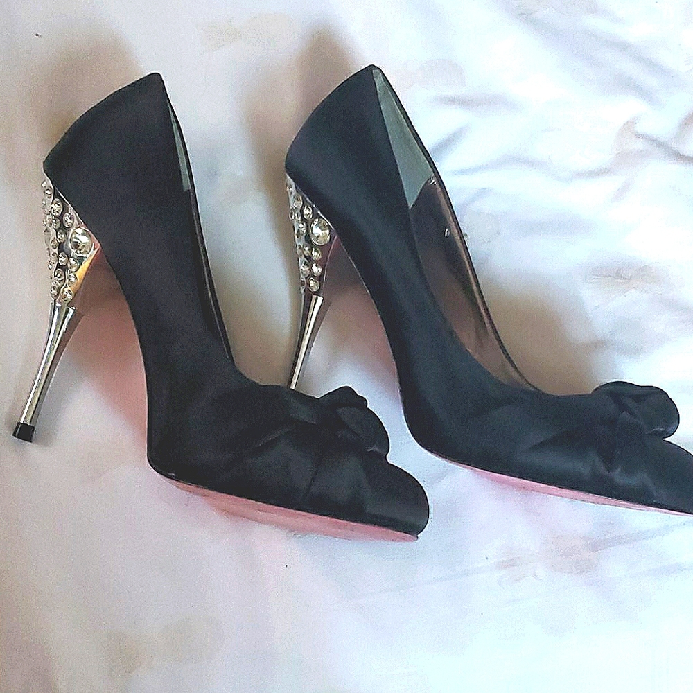Paris Hilton black heels with stones.
